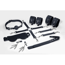 Набор Feral Feelings BDSM Kit 7 Black, наручники, поножи, коннектор, маска, паддл, кляп, зажимы