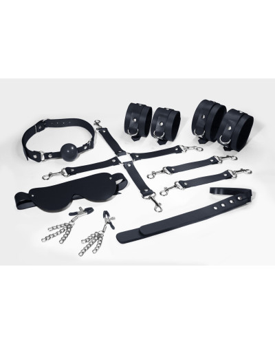 Набор Feral Feelings BDSM Kit 7 Black, наручники, поножи, коннектор, маска, паддл, кляп, зажимы - Фото №1