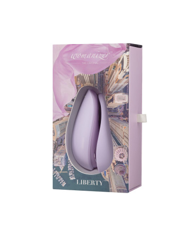 Вакуумний кліторальний стимулятор Womanizer Liberty Lilac, магнітна кришка, 2 насадки - Фото №7